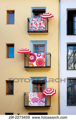 Summer has come to the balconies, Valencia, Comunidad Valenciana, Spain View Large Photo Image Stock Photo - Summer has come to the balconies, Valencia, Comunidad Valenciana, Spain. Fotosearch