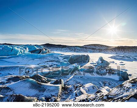 Svinafellsjoekull glacier in Vatnajoekull NP during Winter, view over the frozen glacial lake and the melting glacial front. europe, northern europe, scandinavia, iceland, February. View Large Photo Image Stock Image - Svinafellsjoekull glacier in Vatnajoekull NP during Winter, view over the frozen glacial lake and the melting glacial front. europe, northern europe, scandinavia, iceland, February.. Fotosearch