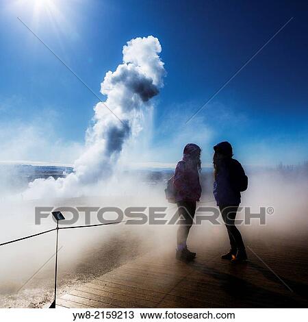 Teenager girls with Strokkur geyser in the background, Iceland. View Large Photo Image Stock Image - Teenager girls with Strokkur geyser in the background, Iceland.. Fotosearch