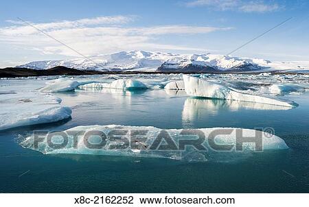 The glacial lagoon Joekulsarlon with glacier Breithamerjoekull in the Vatnajoekull NP. In the background is peak Oeraefajoekull, the highst mountain in Iceland. europe, northern europe, iceland, February. View Large Photo Image Stock Image - The glacial lagoon Joekulsarlon with glacier Breithamerjoekull in the Vatnajoekull NP. In the background is peak Oeraefajoekull, the highst mountain in Iceland. europe, northern europe, iceland, February.. Fotosearch