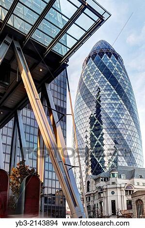 The Leadenhall Building (The Cheese Grater) and 30 St Mary Axe (The Gherkin), City Of London, England. View Large Photo Image Picture - The Leadenhall Building (The Cheese Grater) and 30 St Mary Axe (The Gherkin), City Of London, England.. Fotosearch
