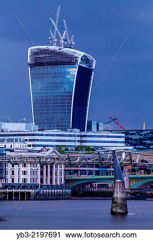 The Millennium Bridge and The 20 Fenchurch (Walkie Talkie) Building, London, England. View Large Photo Image Stock Image - The Millennium Bridge and The 20 Fenchurch (Walkie Talkie) Building, London, England.. Fotosearch