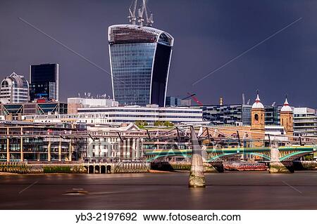 The Millennium Bridge and The 20 Fenchurch (Walkie Talkie) Building, London, England. View Large Photo Image Stock Image - The Millennium Bridge and The 20 Fenchurch (Walkie Talkie) Building, London, England.. Fotosearch