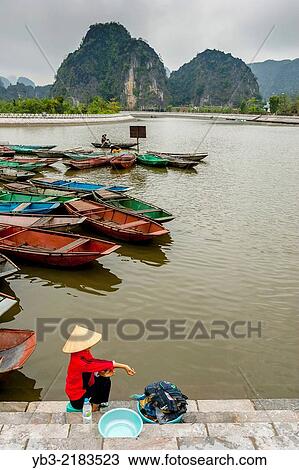 The Ngo Dong River, Tam Coc, Ninh Binh Province, Vietnam. View Large Photo Image Stock Image - The Ngo Dong River, Tam Coc, Ninh Binh Province, Vietnam.. Fotosearch
