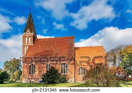 The Saint John Church in Zirkow was built in the 15th Century. The church is located in Zirkow, Moenchgut-Granitz, Ruegen Island, County Vorpommern-Ruegen, Mecklenburg-Western Pomerania, Germany, Europe. View Large Photo Image Stock Photography - The Saint John Church in Zirkow was built in the 15th Century. The church is located in Zirkow, Moenchgut-Granitz, Ruegen Island, County Vorpommern-Ruegen, Mecklenburg-Western Pomerania, Germany, Europe.. Fotosearch