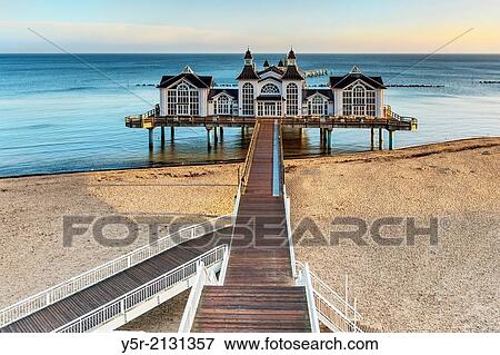 The Sellin Pier is a pier at the Baltic Sea. The pier is 394 meters long. It was inaugurated in 1998, Sellin, Ruegen Island, County Vorpommern-Ruegen, Mecklenburg-Western Pomerania, Germany, Europe. View Large Photo Image Stock Photo - The Sellin Pier is a pier at the Baltic Sea. The pier is 394 meters long. It was inaugurated in 1998, Sellin, Ruegen Island, County Vorpommern-Ruegen, Mecklenburg-Western Pomerania, Germany, Europe.. Fotosearch