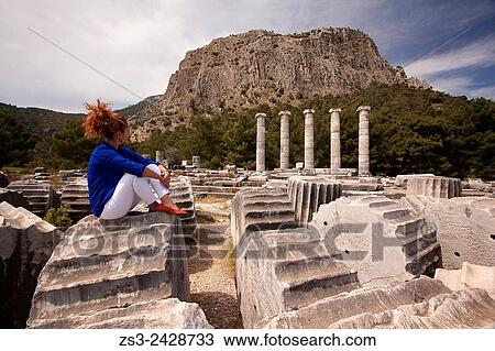 Tourist at the Temple of Athena at the ancient city of Priene, S÷ke, Aydin, Turkey, Europe. View Large Photo Image Stock Image - Tourist at the Temple of Athena at the ancient city of Priene, S÷ke, Aydin, Turkey, Europe.. Fotosearch