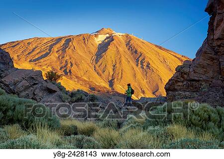 Tourist in Teide National Park, Tenerife, Canary Islands, Spain. View Large Photo Image Stock Image - Tourist in Teide National Park, Tenerife, Canary Islands, Spain.. Fotosearch