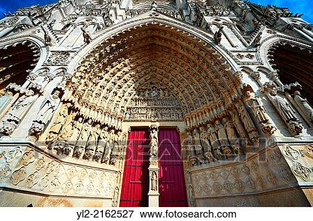 Tympanum of central west portal: Christ in Majesty presides over the Last Day of Judgement, supported by an array of saints. Gothic Cathedral of Notre-Dame, Amiens, France. View Large Photo Image Stock Photo - Tympanum of central west portal: Christ in Majesty presides over the Last Day of Judgement, supported by an array of saints. Gothic Cathedral of Notre-Dame, Amiens, France.. Fotosearch