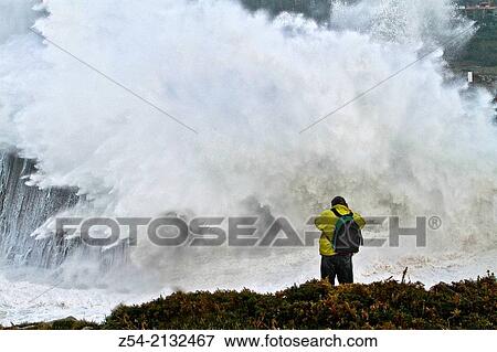 Waves broken at Pria cliffs, and geisers Llanes, Asturias, Spain. View Large Photo Image Stock Photo - Waves broken at Pria cliffs, and geisers Llanes, Asturias, Spain.. Fotosearch