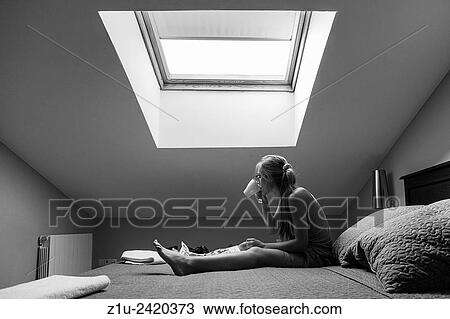 Wellbeing. Girl sitting on the bed, having coffee in the morning. View Large Photo Image Stock Image - Wellbeing. Girl sitting on the bed, having coffee in the morning.. Fotosearch