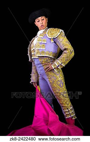 Woman bullfighter holding capote pink on black background. View Large Photo Image Stock Image - Woman bullfighter holding capote pink on black background.. Fotosearch