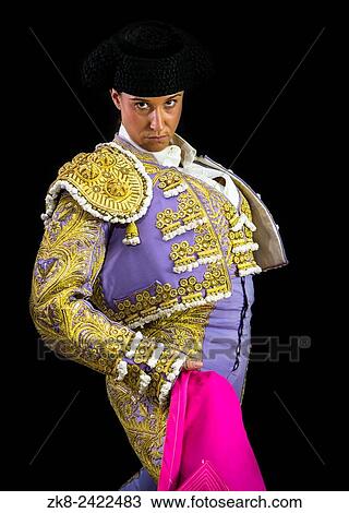 Woman bullfighter holding capote pink on black background. View Large Photo Image Stock Image - Woman bullfighter holding capote pink on black background.. Fotosearch