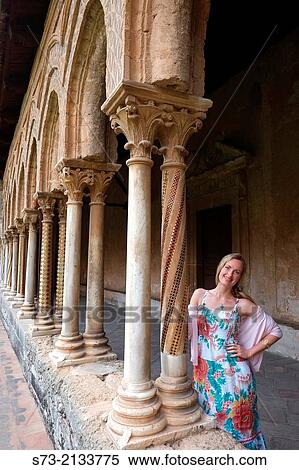 Woman in the Cloister of the Cathedral of Monreale, Palermo, Sicily, Italy View Large Photo Image Stock Photography - Woman in the Cloister of the Cathedral of Monreale, Palermo, Sicily, Italy. Fotosearch