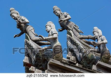 Stock Image - Wooden Sculptures on the Rood of the Sanctuary of Truth in Pattaya, Thailand.. Fotosearch