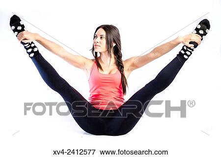 Young Woman doing Fitness in her home. View Large Photo Image Stock Photo - Young Woman doing Fitness in her home.. Fotosearch