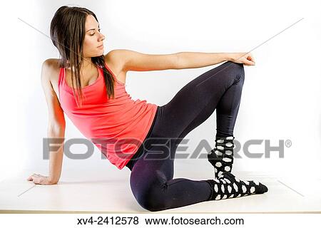 Young Woman doing Fitness in her home. View Large Photo Image Stock Photo - Young Woman doing Fitness in her home.. Fotosearch