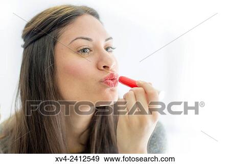Young Woman Making Up. View Large Photo Image Stock Photo - Young Woman Making Up.. Fotosearch