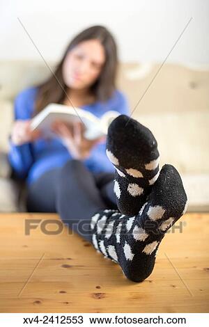 Young Woman studing English on her sofa. View Large Photo Image Stock Image - Young Woman studing English on her sofa.. Fotosearch
