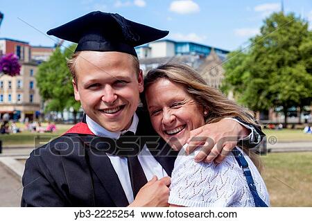 A Proud Mother and Her Graduate Son At The University of Western England (UWE) Degree Ceremony, Bristol, England. View Large Photo Image Picture - A Proud Mother and Her Graduate Son At The University of Western England (UWE) Degree Ceremony, Bristol, England.. Fotosearch