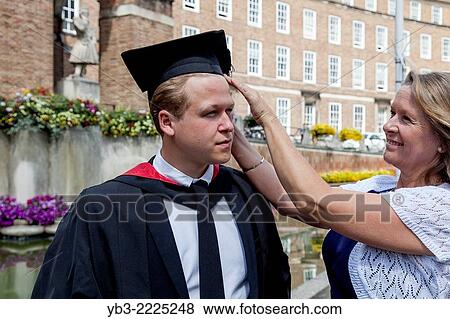 A Proud Mother and Her Graduate Son At The University of Western England (UWE) Degree Ceremony, Bristol, England. View Large Photo Image Stock Photo - A Proud Mother and Her Graduate Son At The University of Western England (UWE) Degree Ceremony, Bristol, England.. Fotosearch