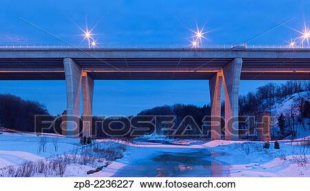 A viaduct (bridge) that on Dundas Street that spans 16 Mile Creek and the Lions Valley in Oakville, Ontario, Canada. View Large Photo Image Stock Photo - A viaduct (bridge) that on Dundas Street that spans 16 Mile Creek and the Lions Valley in Oakville, Ontario, Canada.. Fotosearch
