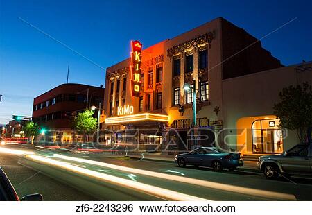 Albuguergue New Mexico Route 66 of Central Avenue of famous historic KIMO Theatre at night exposure with traffic moving exposure Rt 66. View Large Photo Image Stock Photograph - Albuguergue New Mexico Route 66 of Central Avenue of famous historic KIMO Theatre at night exposure with traffic moving exposure Rt 66.. Fotosearch