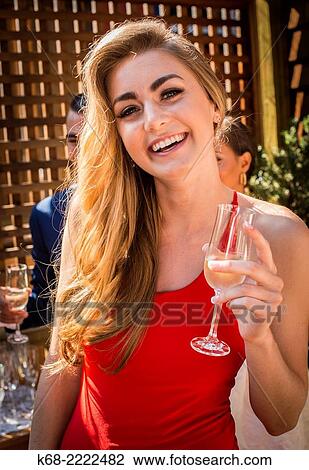 an 18 year old girl in a red dress. View Large Photo Image Stock Image - an 18 year old girl in a red dress.. Fotosearch
