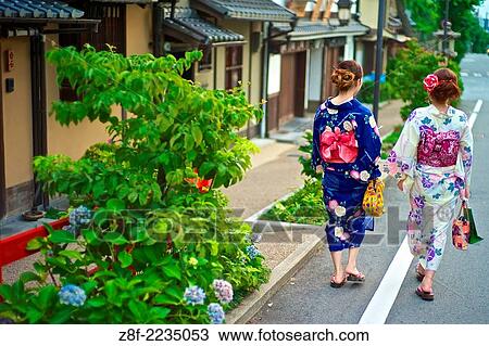 Asian women in traditional kimonos exploring the stores and shops near the Kiyomizu Temple. View Large Photo Image Stock Image - Asian women in traditional kimonos exploring the stores and shops near the Kiyomizu Temple.. Fotosearch