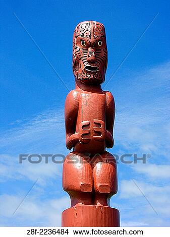 At various sacred spots, carved Maori figures stand guard, Whakatane, New Zealand. View Large Photo Image Picture - At various sacred spots, carved Maori figures stand guard, Whakatane, New Zealand.. Fotosearch