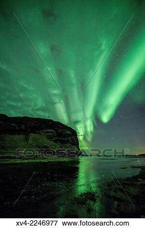 Aurora Borealis or northern Lights during winter at southern Iceland. View Large Photo Image Stock Photo - Aurora Borealis or northern Lights during winter at southern Iceland.. Fotosearch