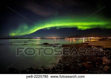 Stock Photography - Aurora Borealis or Northern lights, Kjalarnes, Reykjavik, Iceland.. Fotosearch