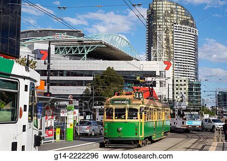 Australia, Victoria, Melbourne, Docklands, Harbour Esplanade, City Circle Route, Yarra Trams, tram, trolley, tramway, public transportation, Etihad Stadium, Watergate, high rise apartment, building,. View Large Photo Image Stock Photograph - Australia, Victoria, Melbourne, Docklands, Harbour Esplanade, City Circle Route, Yarra Trams, tram, trolley, tramway, public transportation, Etihad Stadium, Watergate, high rise apartment, building,.. Fotosearch