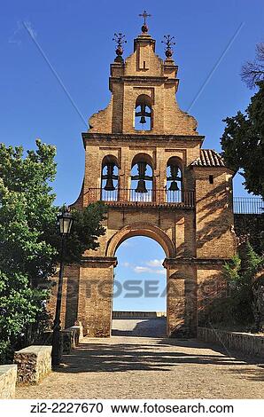 Stock Image - Bell tower, Church of Nuestra Señora del Mayor Dolor, XVth century. Aracena, Huelva province, Spain. Fotosearch