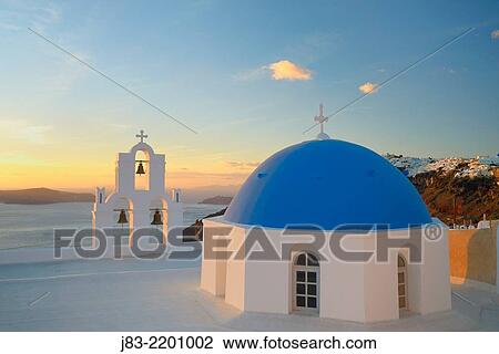 Stock Image - Blue domes of church in Firostefani village, Santorini, Aegean Island, Cyclades Island, Greek Islands, Greece, Europe.. Fotosearch