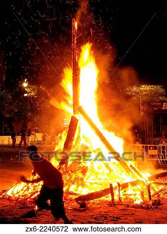Bonfire of St. John’s Night (nit de Sant Joan) to celebrate Summer Solstice arrival at Sant Carles de la Rapita Village. Ebro River Delta Natural Park, Tarragona province, Catalonia, Spain. View Large Photo Image Stock Image - Bonfire of St. John’s Night (nit de Sant Joan) to celebrate Summer Solstice arrival at Sant Carles de la Rapita Village. Ebro River Delta Natural Park, Tarragona province, Catalonia, Spain.. Fotosearch