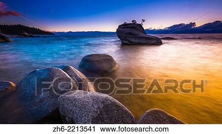 Stock Image - Bonsai Rock at sunset, Lake Tahoe, Nevada, USA.. Fotosearch