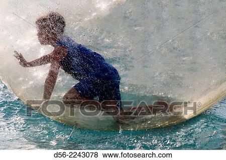 boy inside a bubble floating on a pool, City of Arts and Sciences, Valencia, Spain. View Large Photo Image Stock Photo - boy inside a bubble floating on a pool, City of Arts and Sciences, Valencia, Spain.. Fotosearch