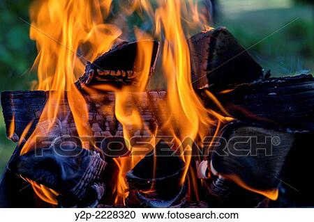 Burning logs. View Large Photo Image Stock Image - Burning logs.. Fotosearch