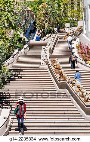 California, CA, Los Angeles, L. A., Downtown, Bunker Hill Steps, Cardiac Hill, 103 Steps, stairway, pedestrian route, ascend, descend, woman, man, Lawrence Halprin, architect, landscape. View Large Photo Image Picture - California, CA, Los Angeles, L. A., Downtown, Bunker Hill Steps, Cardiac Hill, 103 Steps, stairway, pedestrian route, ascend, descend, woman, man, Lawrence Halprin, architect, landscape.. Fotosearch