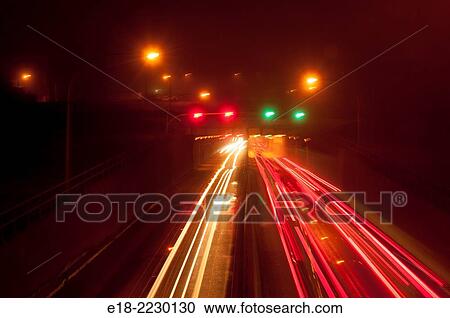 Canada, BC, Richmond. Vehicle lights entering and leaving the Massey Tunnel under the Fraser River, which links the communities of Richmond and Delta. View Large Photo Image Stock Image - Canada, BC, Richmond. Vehicle lights entering and leaving the Massey Tunnel under the Fraser River, which links the communities of Richmond and Delta.. Fotosearch