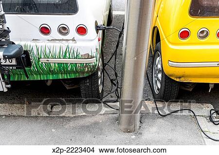 Charging electric cars in Oslo. View Large Photo Image Picture - Charging electric cars in Oslo.. Fotosearch