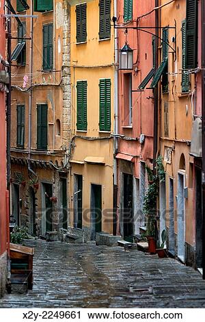 Charming village buildings and alley, Porto Venere, Liguria, Italy. View Large Photo Image Stock Image - Charming village buildings and alley, Porto Venere, Liguria, Italy.. Fotosearch