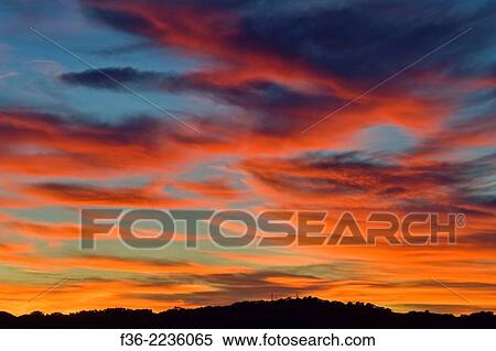 Cirrus clouds at sunset, California. View Large Photo Image Stock Photography - Cirrus clouds at sunset, California.. Fotosearch