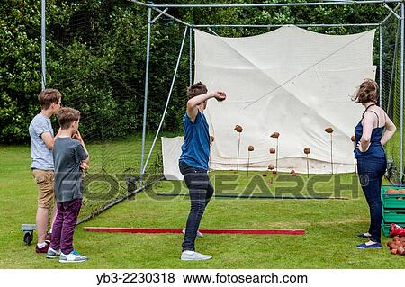 Coconut Shy, Withyham Village Fete, Sussex, England. View Large Photo Image Stock Photo - Coconut Shy, Withyham Village Fete, Sussex, England.. Fotosearch