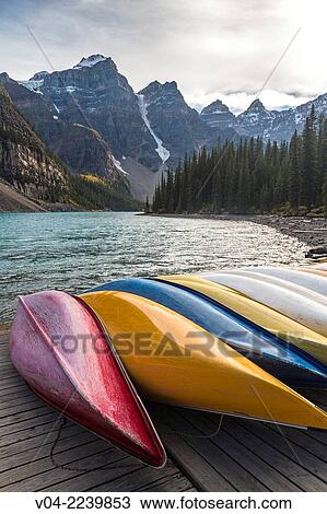Colorful boats at Moraine Lake in the Banff National Park, Alberta, Canada View Large Photo Image Stock Image - Colorful boats at Moraine Lake in the Banff National Park, Alberta, Canada. Fotosearch
