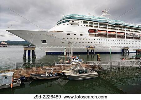 Cruise ship ´Rhapsody of the Seas´ at the cruise ship terminal, Prince Rupert, BC. View Large Photo Image Stock Photo - Cruise ship ´Rhapsody of the Seas´ at the cruise ship terminal, Prince Rupert, BC.. Fotosearch