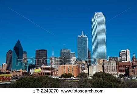 Dallas Texas skyline at sunset of modern skyscrapers in downtown Dallas city across expressway. View Large Photo Image Stock Image - Dallas Texas skyline at sunset of modern skyscrapers in downtown Dallas city across expressway.. Fotosearch