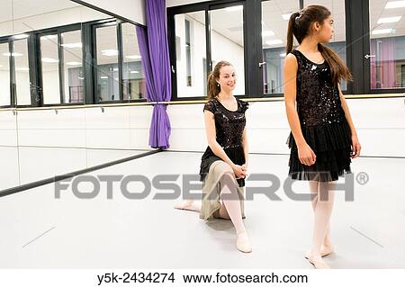 Den Bosch, ´s-Hertogenbosch, Netherlands. Class of schoolgirls practising classical ballet at a local balletstudio. View Large Photo Image Picture - Den Bosch, ´s-Hertogenbosch, Netherlands. Class of schoolgirls practising classical ballet at a local balletstudio.. Fotosearch