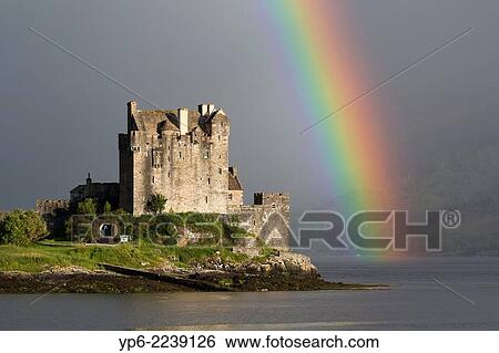 Eilean Donan Castle with rainbow, near Dornie, Scotland. View Large Photo Image Stock Photograph - Eilean Donan Castle with rainbow, near Dornie, Scotland.. Fotosearch